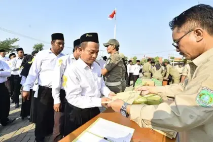 SimulasiCAT.ID - Pemkab Pasuruan Berhasil Menyerahkan 620 SK Pengangkatan PPPK Waktu dan 35 SK Pensiun TMT 1 Januari 2026